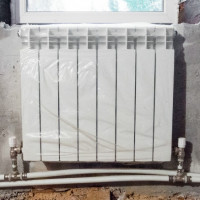 Connexion d'un radiateur de chauffage à un système à deux tuyaux: choisir la meilleure option de raccordement